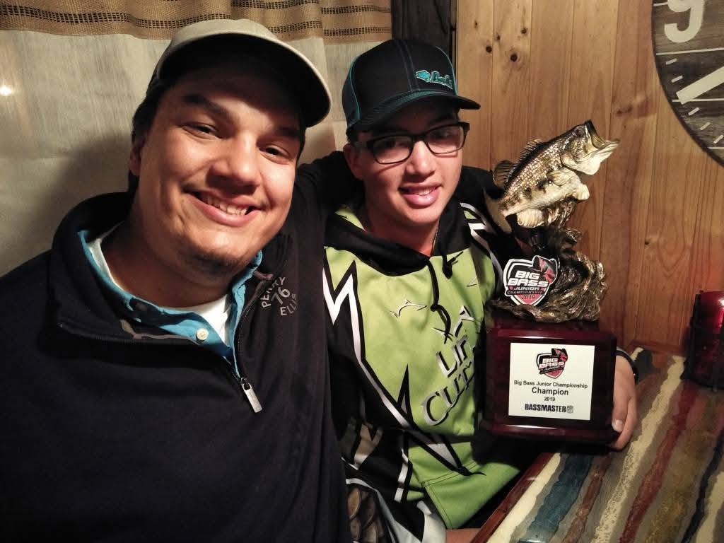 AJ-Max and his brother with the 2019 Big Bass Junior Championship trophy